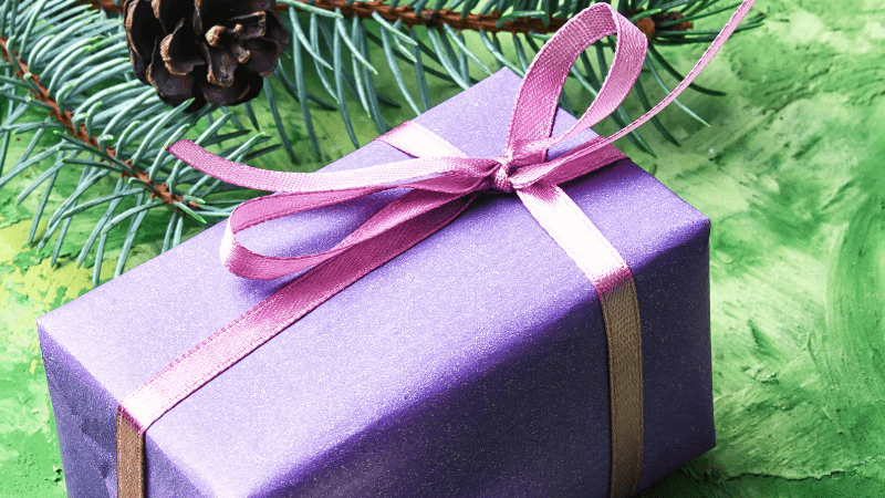 Win of doneer een rijkelijk gevuld kerstpakket!